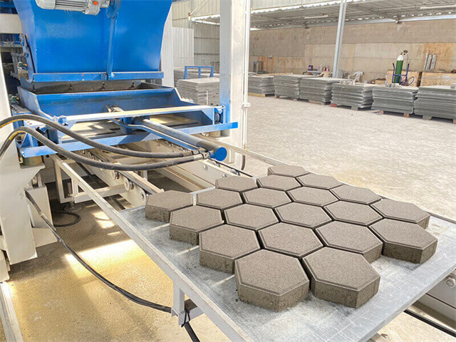The Evolution and Working Principle of Paver Block Manufacturing Machines
